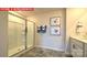 This bathroom has a beautiful glass shower and modern vanity with stone flooring for added style at 11213 Cardinal Creek Ave, Charlotte, NC 28215