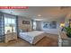 The main bedroom is spacious and bright, with a large window, soft carpet, and neutral walls at 11213 Cardinal Creek Ave, Charlotte, NC 28215