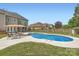 Backyard with a swimming pool, an umbrella, outdoor lounge chairs and a gazebo at 113 Dairy Farm Rd, Mooresville, NC 28115