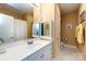 Bright bathroom featuring a white vanity, decorative mirror and neutral wall color at 139 Harper Lee St, Davidson, NC 28036