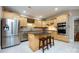Well-equipped kitchen featuring stainless steel appliances, granite countertops, and ample cabinet space at 139 Harper Lee St, Davidson, NC 28036