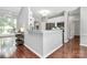 Open concept kitchen featuring breakfast bar, stainless appliances and stylish cabinetry at 13930 Wild Heather Ct, Charlotte, NC 28273