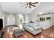 Spacious living room featuring hardwood floors and open access to the kitchen and dining area at 13930 Wild Heather Ct, Charlotte, NC 28273