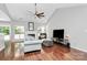 Inviting living room with vaulted ceiling, hardwood floors, and lots of natural light at 13930 Wild Heather Ct, Charlotte, NC 28273