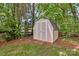 A backyard storage shed offering practical storage solutions and organization at 13930 Wild Heather Ct, Charlotte, NC 28273