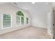 Sun-filled room with three large windows creates a relaxing and inviting atmosphere at 15216 Ballantyne Country Club Dr, Charlotte, NC 28277
