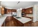 Modern kitchen with center island, stainless appliances, and stylish cabinetry at 15216 Ballantyne Country Club Dr, Charlotte, NC 28277