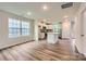 Open-concept kitchen featuring stainless steel appliances, an island, and ample natural light, great for entertaining at 1545 Cottage Creek Dr, Bessemer City, NC 28016