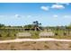 Community playground with benches and a secure fence, offering a safe recreational space at 1545 Cottage Creek Dr, Bessemer City, NC 28016