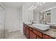 Bathroom features dual vessel sinks with granite counters and modern fixtures at 1814 Still Water Ln, Fort Mill, SC 29707