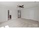 Large bedroom showing neutral carpet, ceiling fan, and ample space at 1814 Still Water Ln, Fort Mill, SC 29707