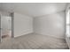 Open bedroom with neutral carpet, bright natural light from the window at 1814 Still Water Ln, Fort Mill, SC 29707