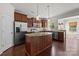 Spacious kitchen features an island, stainless steel appliances, and lots of cabinet space at 1814 Still Water Ln, Fort Mill, SC 29707