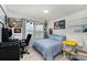 Fun bedroom with a comfortable bed, desk and Star Wars themed wall decorations for a playful space at 189 Fesperman Cir, Troutman, NC 28166