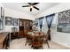 Cozy dining room featuring a classic wooden table set, charming decor, and plenty of natural light at 189 Fesperman Cir, Troutman, NC 28166