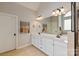 Bright bathroom with double vanity, towel warmer, and natural light at 1912 Windmere Dr, Monroe, NC 28110