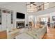 Spacious living room with a fireplace, high ceilings, and hardwood floors at 1912 Windmere Dr, Monroe, NC 28110