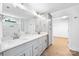 Modern bathroom with double vanity, marble countertops, and glass shower at 2027 Marquesas Ave, Tega Cay, SC 29708