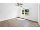 Bright bedroom with a large window and neutral color palette at 2027 Marquesas Ave, Tega Cay, SC 29708