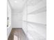 Walk-in closet with wire shelving and durable laminate flooring at 2027 Marquesas Ave, Tega Cay, SC 29708