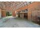Bright and open barn interior with wooden beams and livestock stalls, providing a functional agricultural space at 2291 Howell Rd, Midland, NC 28107