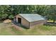 Spacious outbuilding with ample storage and a well-maintained exterior, perfect for a variety of uses at 2291 Howell Rd, Midland, NC 28107