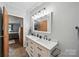 Modern bathroom showcasing a double vanity, contemporary lighting, and stylish fixtures, creating an elegant space at 2291 Howell Rd, Midland, NC 28107