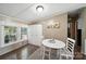 Cozy dining area with a white table set, perfect for casual meals and enjoying natural light at 2291 Howell Rd, Midland, NC 28107