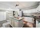 Bright kitchen featuring a center island, modern appliances, and ample counter space for cooking at 2291 Howell Rd, Midland, NC 28107