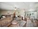Spacious living room with cozy seating, wood floors, and ceiling fan, perfect for relaxation at 2291 Howell Rd, Midland, NC 28107