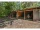Exterior view of a wooden storage shed featuring open bays and ample space for equipment or tools at 2291 Howell Rd, Midland, NC 28107