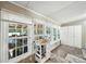 Bright sunroom with abundant natural light, offering a serene space with views of the outdoors at 2291 Howell Rd, Midland, NC 28107