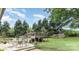 Expansive backyard featuring a wooden deck, above-ground pool, mature trees and garden area at 240 China Grove Rd, China Grove, NC 28123
