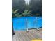 Close up of above-ground pool showing entry ladder at 240 China Grove Rd, China Grove, NC 28123