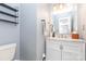 Bathroom featuring white vanity with marble countertop and a glass door shower at 2636 Forest Grove Ct, Charlotte, NC 28269