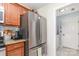 Kitchen featuring stainless steel refrigerator and access to the laundry room at 2636 Forest Grove Ct, Charlotte, NC 28269