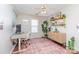 Home office area with hardwood floors, shelves and a large window at 2636 Forest Grove Ct, Charlotte, NC 28269