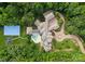 Expansive property featuring a luxury home, swimming pool, tennis court, circular driveway and lush landscaping at 2926 Crane Rd, Waxhaw, NC 28173