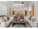 Elegant living room offers a view of the kitchen, a large island, and modern decor for a relaxed, open atmosphere at 2926 Crane Rd, Waxhaw, NC 28173