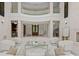 Elegant living room highlighting a soaring entry, marble floors, and bright natural light at 2926 Crane Rd, Waxhaw, NC 28173