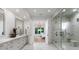 Luxurious bathroom with a double vanity, marble countertops, and a glass-enclosed shower at 3020 Brooks Mill Ln, Wingate, NC 28174