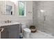 Modern bathroom featuring a glass shower, marble accents, and a sleek vanity at 3020 Brooks Mill Ln, Wingate, NC 28174