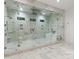 Modern bathroom with a large glass-enclosed shower, soaking tub, and marble flooring at 3020 Brooks Mill Ln, Wingate, NC 28174