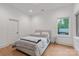 Bright bedroom with a large window and neutral decor at 3020 Brooks Mill Ln, Wingate, NC 28174