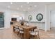 Elegant dining room featuring a large wooden table, modern decor, and an open layout at 3020 Brooks Mill Ln, Wingate, NC 28174