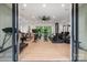 Bright gym featuring modern equipment and large windows overlooking the yard at 3020 Brooks Mill Ln, Wingate, NC 28174