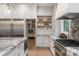 Walk-in pantry with ample storage, shelving, and pull-out drawers for optimal organization at 3020 Brooks Mill Ln, Wingate, NC 28174