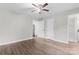 Bedroom featuring a ceiling fan and wood-look flooring at 3400 Reid Ave, Charlotte, NC 28208