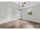 Bedroom featuring a ceiling fan and wood-look flooring at 3400 Reid Ave, Charlotte, NC 28208