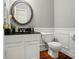 Clean half-bathroom featuring white cabinetry and modern fixtures at 3912 Grace Ct, Indian Trail, NC 28079